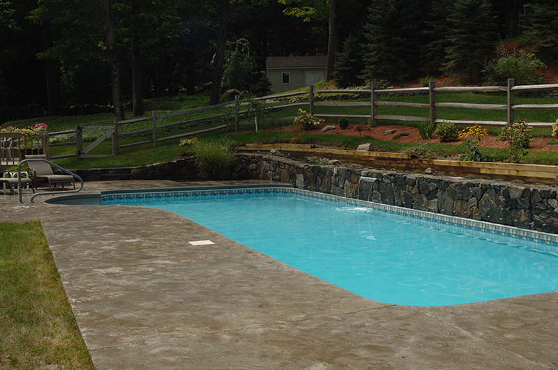 Swimming pool and stamped concrete project example 194